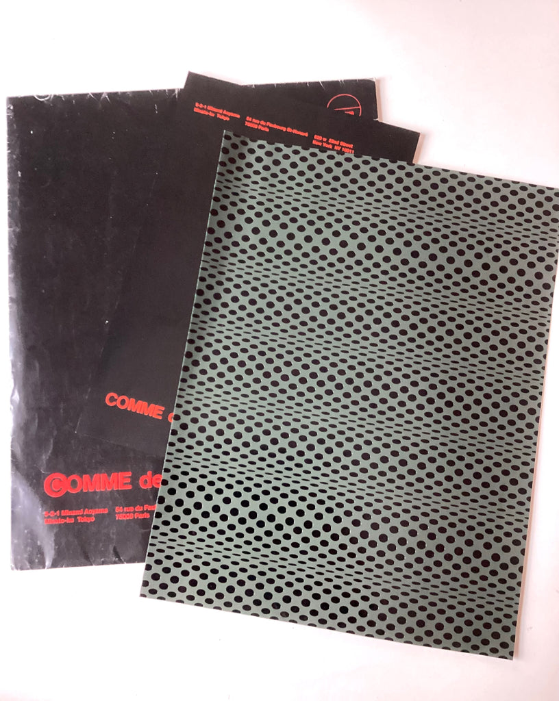 Undated collection renewal notice, Comme des Garcons  13”x10” sheet Dark green op-art pattern on black