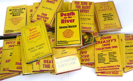 Shelf of yellow books/ Gollancz mysteries